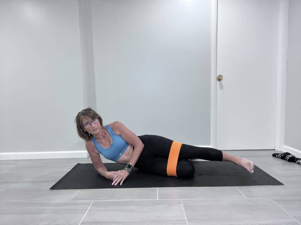 lying side leg lift with booty band