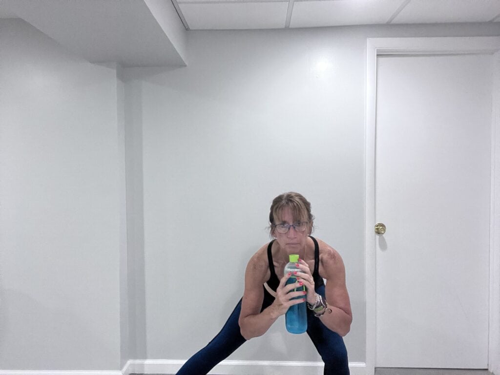 lateral lunge with water bottle
