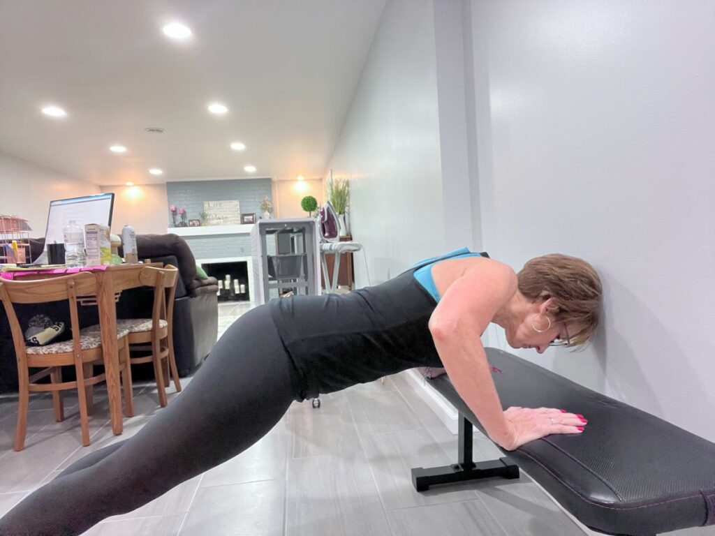 10 BEST ALTERNATIVE EXERCISES FOR TRICEP DIPS AFTER 60 3 push up on weight bench
